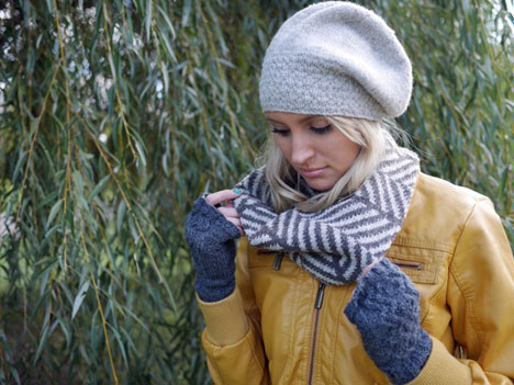 Goobalini knit hat in gray worn by blond girl with yellow jacket